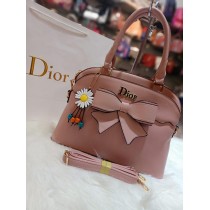 Dior with stylish look with flower keychain